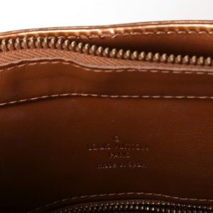 Prawidłowe wykończenie wewnętrznej kieszeni Louis Vuitton Houston