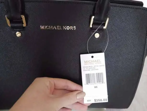 jak rozpoznac podrobke michael kors metka